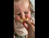 Lady Feeds Kid Lemon Slice then Squints