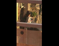 Collab IITW - Girl sits on railing ocean face mask