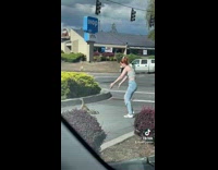 Collab BitchMP - Girl guides ducks across parking lot to safe grass