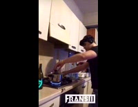 Guy plays DJ set with pots on stove
