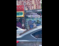 Man wearing metal helmet putting own poster on wall pt 1 