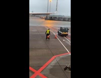 Collab Kale Salad IG - Airplane worker flips cones on the job