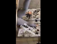 Girl sits edge of tub falls back 