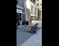 Girl gives brown dog stroller puppuccino starbucks 