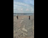 Woman black skirt dress stand pictorial beach