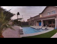 Tennis table blown by wind hits planter