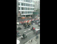 Motorcycle bikes and quad ATVs filling street