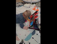 Baby laughs at self in the mirror part 1