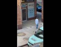 Collab WINY - Man drags banana tied to rope 