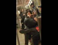 Man ride train with rat on bag