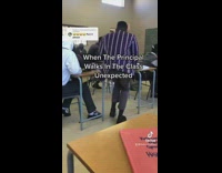 Principal walks into class and whole class hustles back to seat