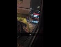 Man push pickup truck at drive thru