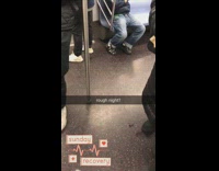 Man on subway train wears mismatched shoes