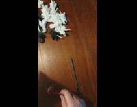 Girl makes halloween candy ghost paper bag 