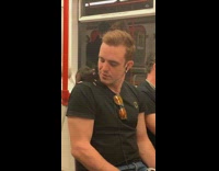 Pt. 3 Guy drinking monster energy drink has black rat on his shoulder on the train