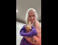 Woman rescues kitten found underneath trash bin