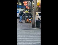 Guy tries to put out small fire in trashcan