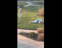 Woman Easter bunny costume WAP Dance front yard