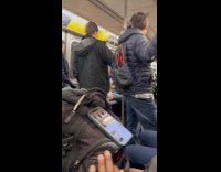 Guys fight inside subway wrestles each other