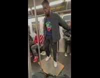 Man tap dance on his feet inside the train at new york 