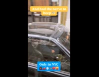 Man drives black car in the sidewalk