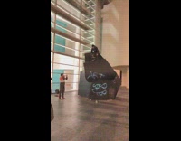 man falls off black rock skateboard