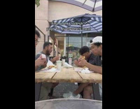 Guys eating in silence laugh at same time