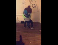 Guy in neon green jacket slams guy in red jacket wood floors