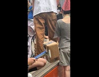 Tablet smash at gnome party on street