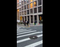 Collab WINY - Man tosses football ball middle of street
