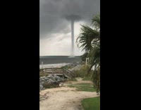 Long skinny cloud sky ocean beach 