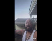 Guy tells son to get in car 