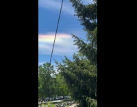 Cloud with rainbow colors seen in sky