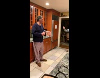 Girl in purple pajamas dance dad