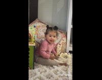 Little baby gives wholesome smiling reaction