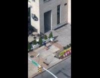 Parents inappropriate photoshoot with daughter on sidewalk