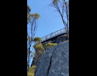 Man tiktok dance near the balcony barrier