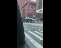 Shirtless guy plays flute outside taco bell 