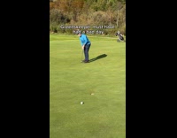 Golf ball keeps on rolling around grass