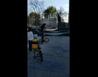 Guy confetti streamer costume suit rides skateboard 