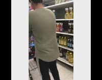 Green shirt adidas pants cart grocery store