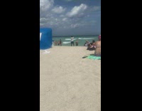 Woman bandana bikini walk on beach siren