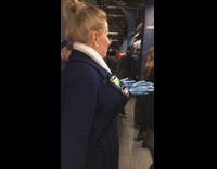 Lady wears blue marble hands on chest