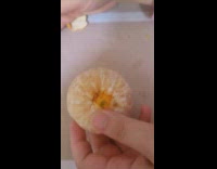 Orange opened with small orange seen inside