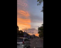 Half of sunset sky clouds look weird