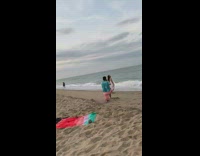 Woman white dress beach shore photo shoot
