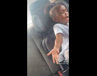 Girl sing and dance selfie video inside car