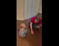 Dad pretend tantrum to make baby laugh