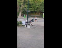 Black shirt guy body paint statue bench 