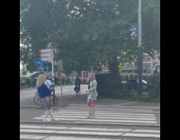 Girl dress long boots honked at pedestrian
